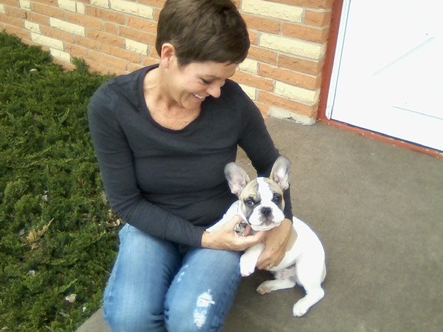 Woman with cute puppy